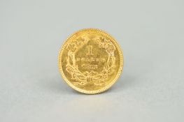 A GOLD ONE DOLLAR U.S.A., 1873, approximately 1.6 grams