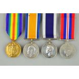 A WWI/II LONG SERVICE GROUP OF FOUR MEDALS, named as follows, British War and Victory PLY-19296