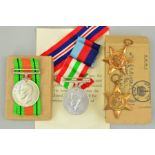 TWO BOXED MINT CONDITION WWII MEDALS, un-named, 1939-45, Italy Stars, War medal and in a separate