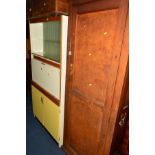 A STAINED PINE SINGLE DOOR CUPBOARD, approximate width 74cm x depth 41cm x height 191cm, together