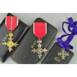A BOXED MBE (CIVILIAN), together with a boxed OBE (Military), together with a boxed Canadian