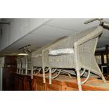 A PAIR OF PAINTED WICKER BEDROOM CHAIRS together with a pair of similar occasional tables (4)