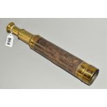 A LEATHER CASED BRASS FOUR DRAW TELESCOPE, no makers marks, some damage and wear, length when
