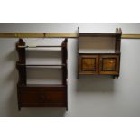 AN EDWARDIAN MAHOGANY TWO DOOR HANGING BOOKCASE together with another hanging bookcase (2)