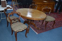 A VICTORIAN BURR WALNUT OVAL TILT TOPPED LOO TABLE, approximate width 150cm x depth 110cm x height