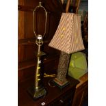 A MODERN BRASSED TABLE LAMP, together with a carved hardwood table lamp (2)