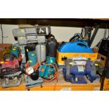 A COLLECTION OF BOXED ELECTRIC HAND TOOLS to include routers, bench sander, drills, jigsaws etc (