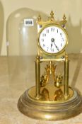 A GLASS DOMED ANNIVERSARY CLOCK MONOGRAMMED CBE? to the movement, no key, approximate height 27cm