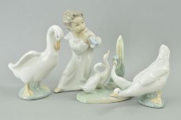 A LLADRO CHERUB PLAYING MUSICAL INSTRUMENT, height 16cm, together with three Nao duck figures/