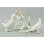 A LLADRO CHERUB PLAYING MUSICAL INSTRUMENT, height 16cm, together with three Nao duck figures/