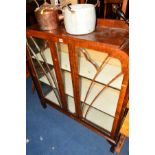 AN EDWARDIAN MAHOGANY ASTRAGAL GLAZED TWO DOOR DISPLAY CABINET, approximate width 110cm x depth 33cm