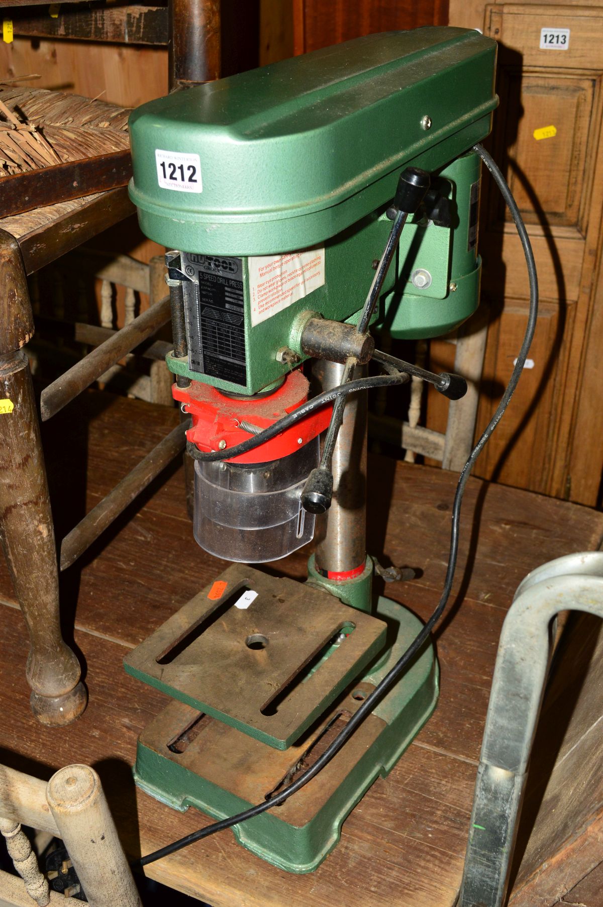 A NU-TOOL FIVE SPEED PILLAR DRILL PRESS