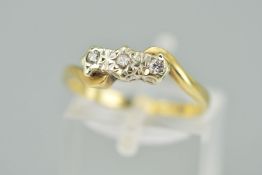 A 9CT GOLD THREE STONE DIAMOND RING, the three brilliant cut diamonds with illusion settings to