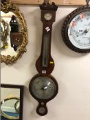 A GEORGIAN MAHOGANY AND INLAID BANJO BAROMETER