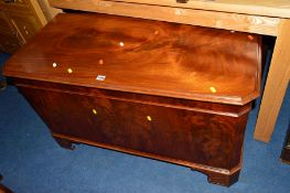 A REPRODUCTION MAHOGANY BLANKET CHEST
