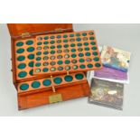 A COIN CABINET OF SIX DRAWERS, one drawer containing 23 Roman coins, to include a UK 2001 Golden