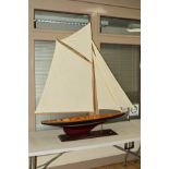 A LARGE WOODEN MODEL DISPLAY YACHT, scratch or kit built, complete and finished to a very good