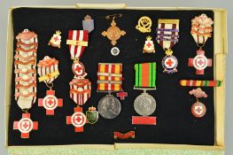 A CARDBOARD BOXED FRAME OF MEDALS AND BADGES, all relating to the service of a V.B. Thompson in