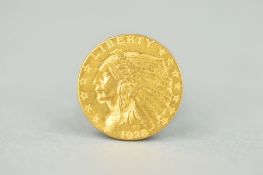 A GOLD INDIAN HEAD TWO AND AN HALF DOLLAR COIN, U.S.A. 1928