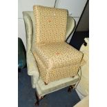 AN UPHOLSTERED GREEN WING BACK ARMCHAIR, together with a bedroom chair (2)