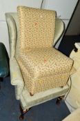 AN UPHOLSTERED GREEN WING BACK ARMCHAIR, together with a bedroom chair (2)