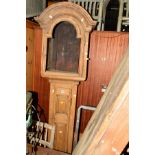 A RECTANGULAR STAINED PINE FOLDING TABLE, together with a beech longcase clock carcase (2)