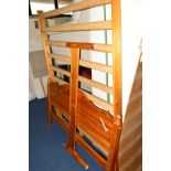 A 4' 6'' PINE BED FRAME