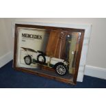 A PINE FRAMED WALL MIRROR of a 1908 Mercedes tourer motor vehicle vehicle 88cm x 63cm