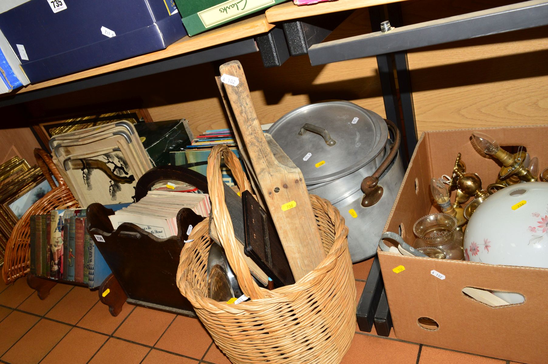 A QUANTITY OF SUNDRY ITEMS, to include wicker baskets, ceiling lights, records, books, pans,