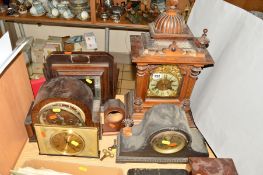 FOUR VARIOUS MANTEL CLOCKS AND A CLOCK CASE, to include a bracket clock, with Roman numeral dial,