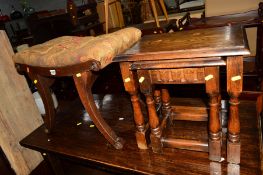 A REPRODUCTION MAHOGANY PIANO STOOL together with an oak nest of two tables (2)