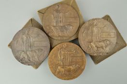 FOUR WWI MEMORIAL DEATH PLAQUES, three of which are contained in original card envelopes, Thomas