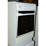 AN INDESIT ELECTRIC COOKER
