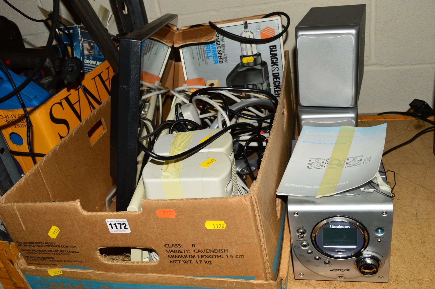 A BOX CONTAINING A 19' LCD MONITOR, a Black and Decker drill, keyboard, small pc speakers, and a