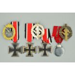 SEVEN WWII 3RD REICH MEDALS AND BADGES, as follows, a WWII Coastal Artillery Badge gold and silver