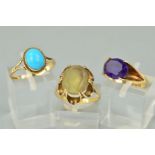 THREE 9CT GOLD GEM SET RINGS, the first designed as an oval amethyst within a four claw setting to