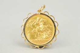 A FULL GOLD SOVEREIGN, in a yellow metal mount, Victoria 1894