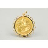 A FULL GOLD SOVEREIGN, in a yellow metal mount, Victoria 1894