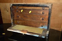 A PAINTED ENGINEERS CHEST with four drawers and contents (distressed)