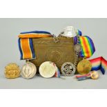 A WWI PRINCESS MARY TIN CONTAINING A WWI PAIR OF MEDALS, named 57138 Pte E. Kendall, Cheshire