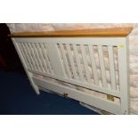 A MODERN PAINTED OAK BEDFRAME