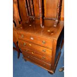 AN EDWARDIAN MAHOGANY AND INLAID CHEST OF FOUR DRAWERS (alterations)