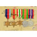 A SWING MOUNTED GROUP OF FIVE WWII MEDALS, as follows, 1939-45, Africa (8th Army bar), Italy