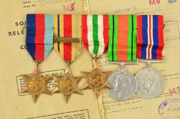 A SWING MOUNTED GROUP OF FIVE WWII MEDALS, as follows, 1939-45, Africa (8th Army bar), Italy