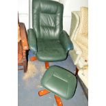 A DARK GREEN LEATHER SWIVEL CHAIR ON A WOODEN BASE, together with a matching stool (2)