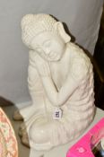A CERAMIC ORIENTAL FIGURE, seated, height approximately 35cm
