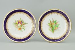 A PAIR OF ROYAL WORCESTER DESSERT PLATES, florally decorated, diameter approximately 23cm (2)