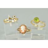 THREE RINGS, the first designed as an oval cameo panel with open trifurcated shoulders, stamped 9ct,