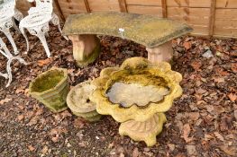 A COMPOSITE CURVED BENCH, together with a oyster shaped bird bath, an octagonal composite planter