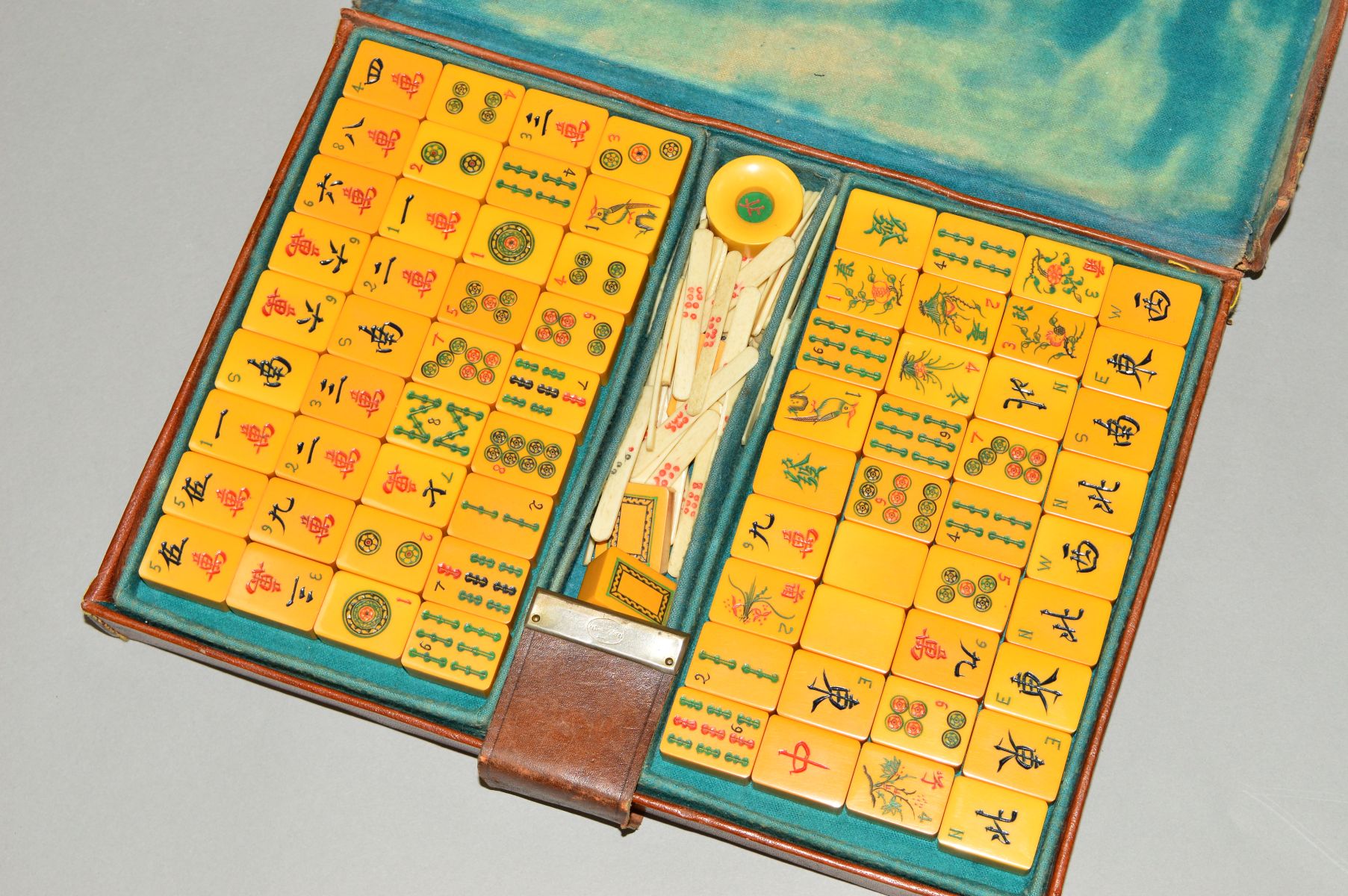 A CASED MAH JONG SET, (case has handle broken)